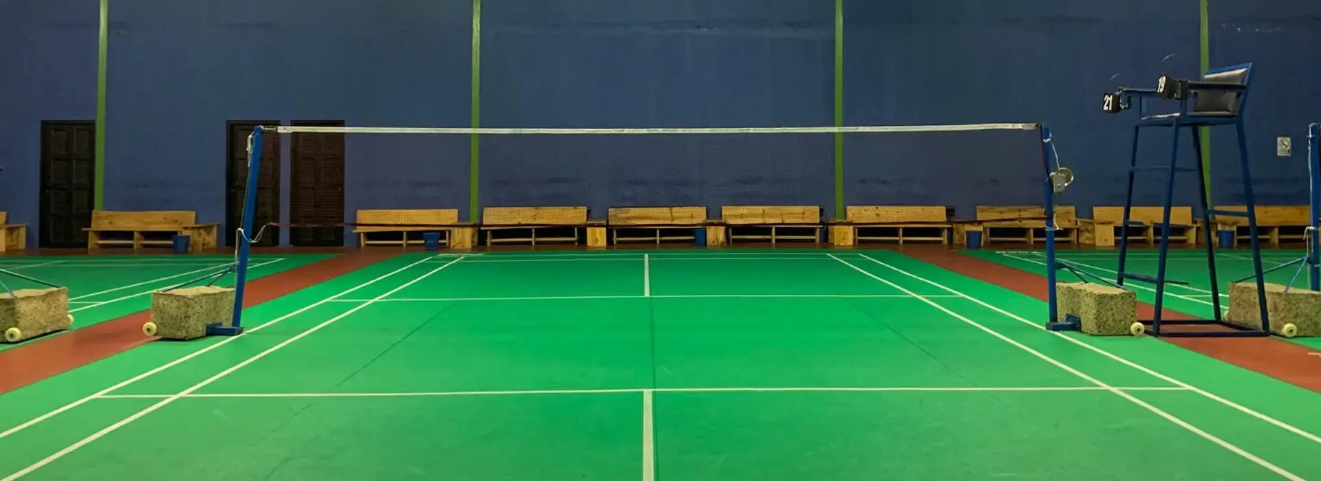 Floodlit tennis court at Lodha Sadahalli